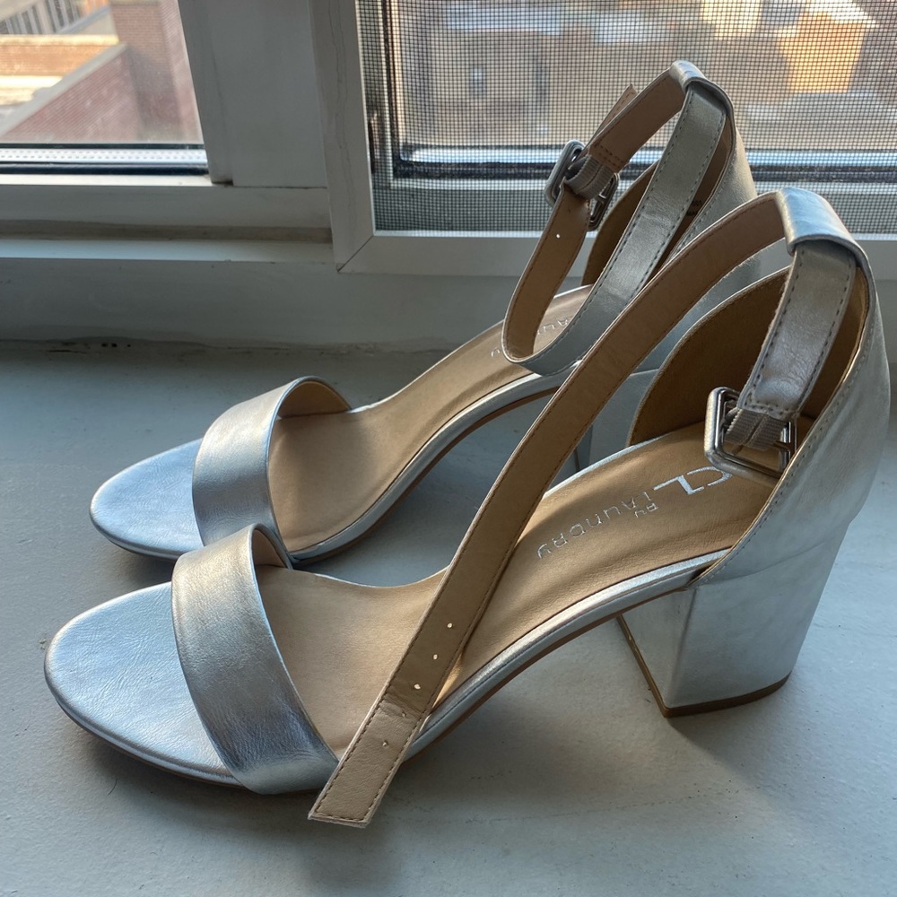 Silver heels size 9.5. New never worn.
